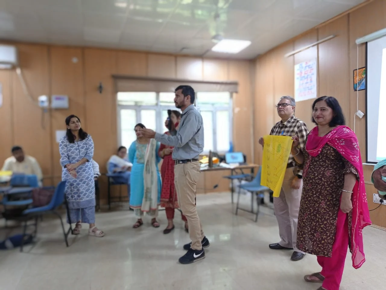 Educators presenting a group activity during a workshop